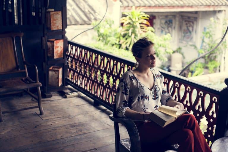 Young Woman Reading Book Concept