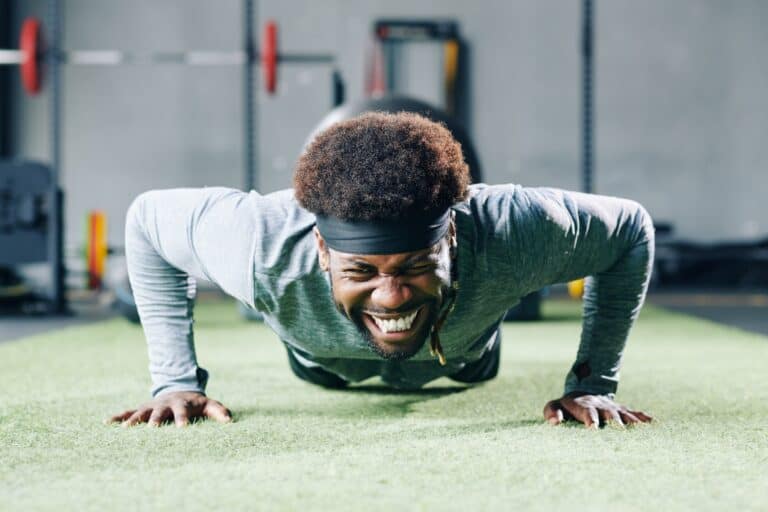 Man doing push-ups motivated for success