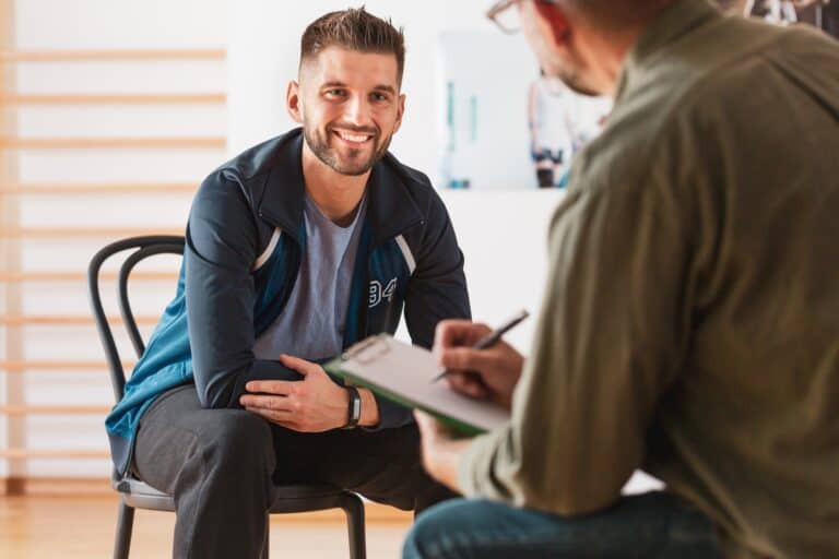 Man in therapy session discussing his growth after trauma